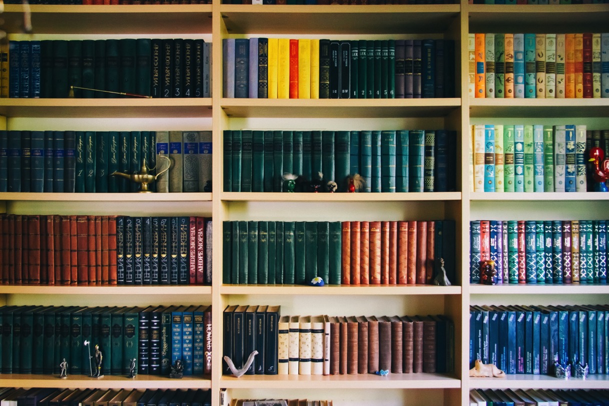 Books in bookshelf in library